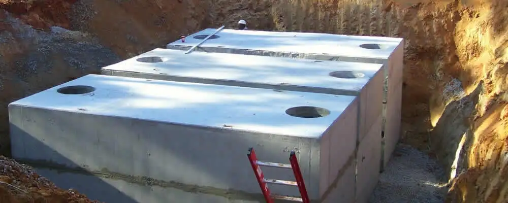 Septic tank installation site with a newly placed concrete tank in Mountain View, CA